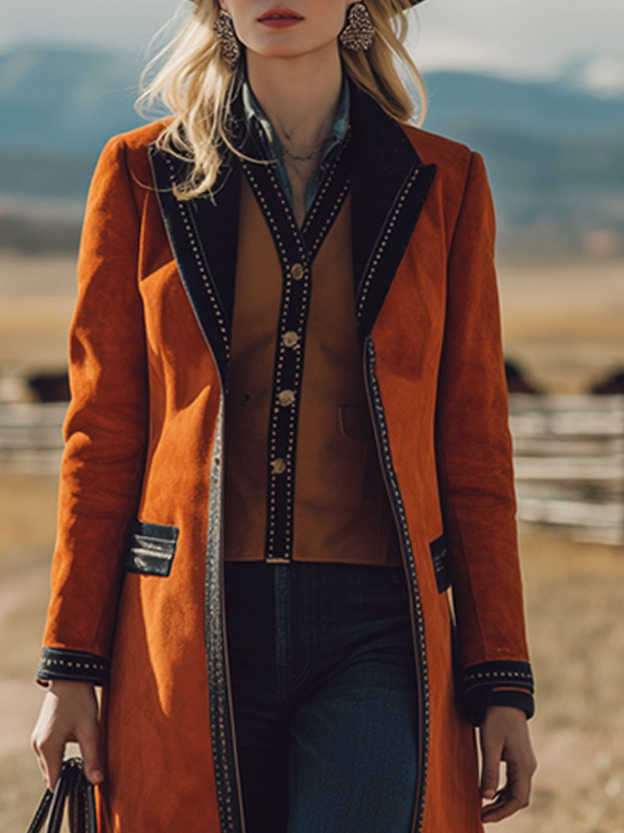 Veste en faux suède orange au style rétro western avec bord noir
