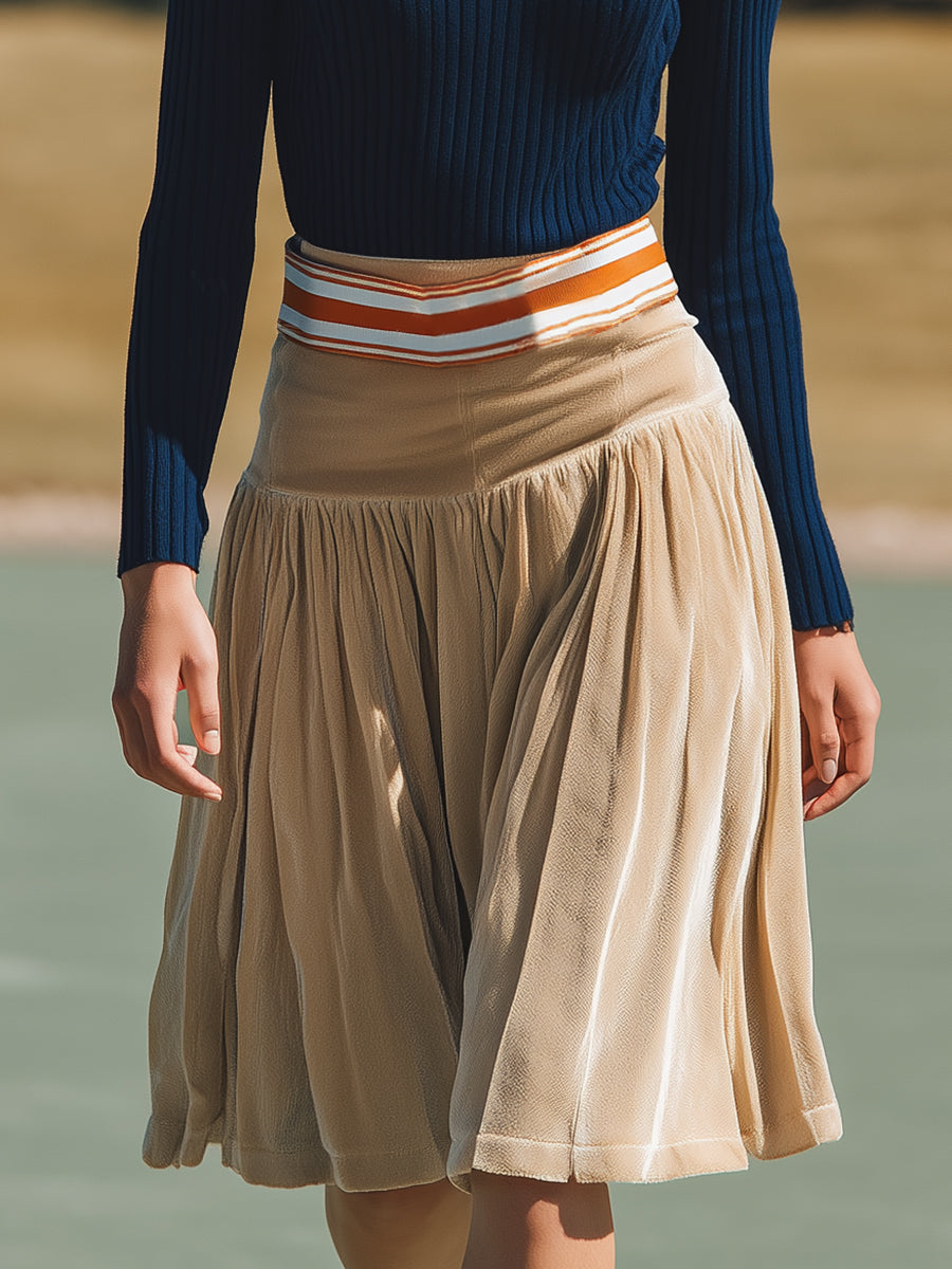 Ensemble Élégant en Tricot Bleu Foncé avec Revers et Jupe en Velours Beige