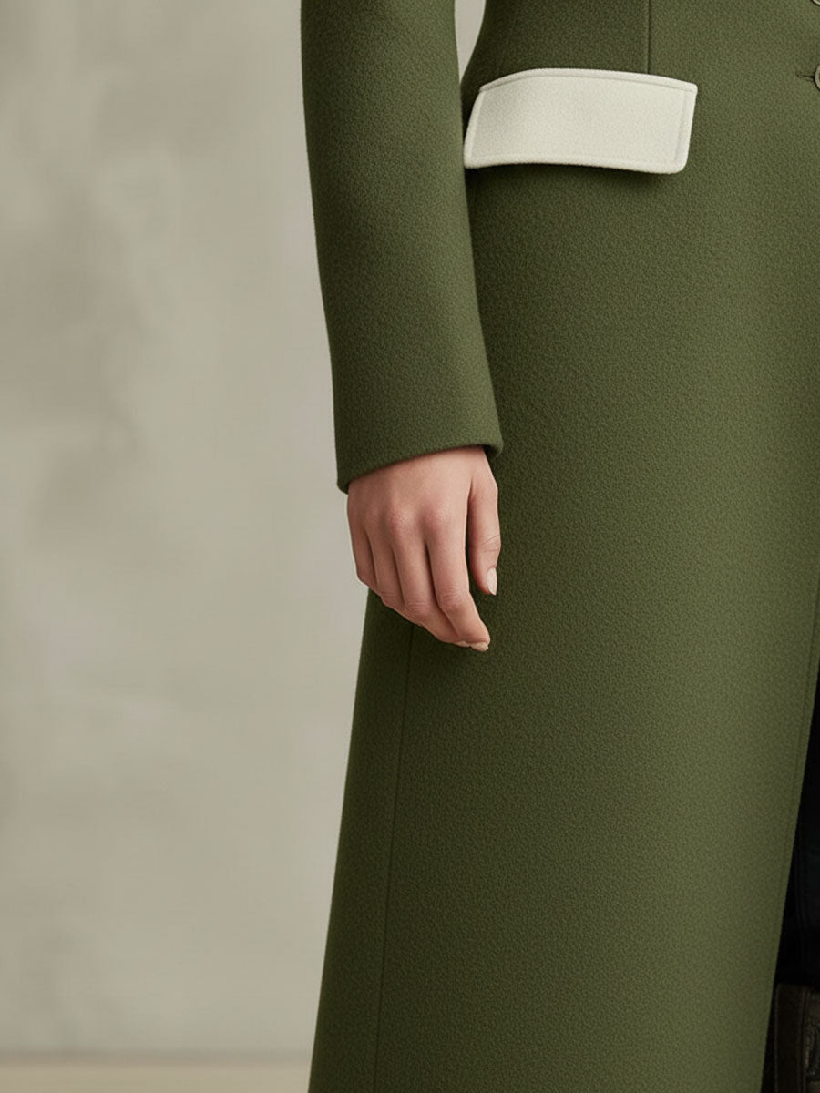 Veste en laine élégante avec col, boutonnage simple et poches à surpiqûres contrastées