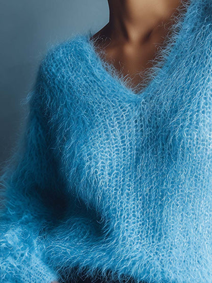 Léger pull en laine tricoté bleu clair avec col en V décontracté