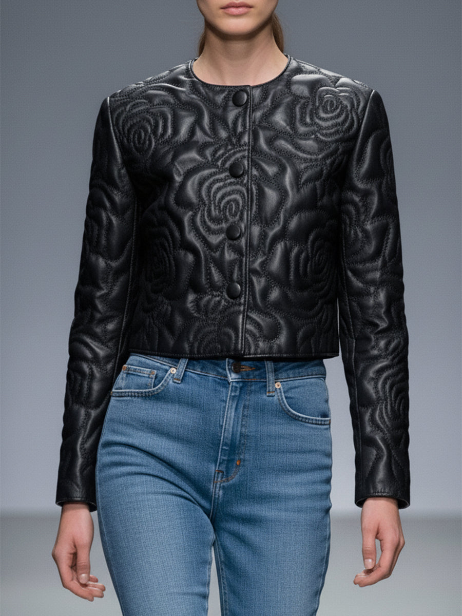 Veste courte en simili cuir noir avec détails floraux au col rond