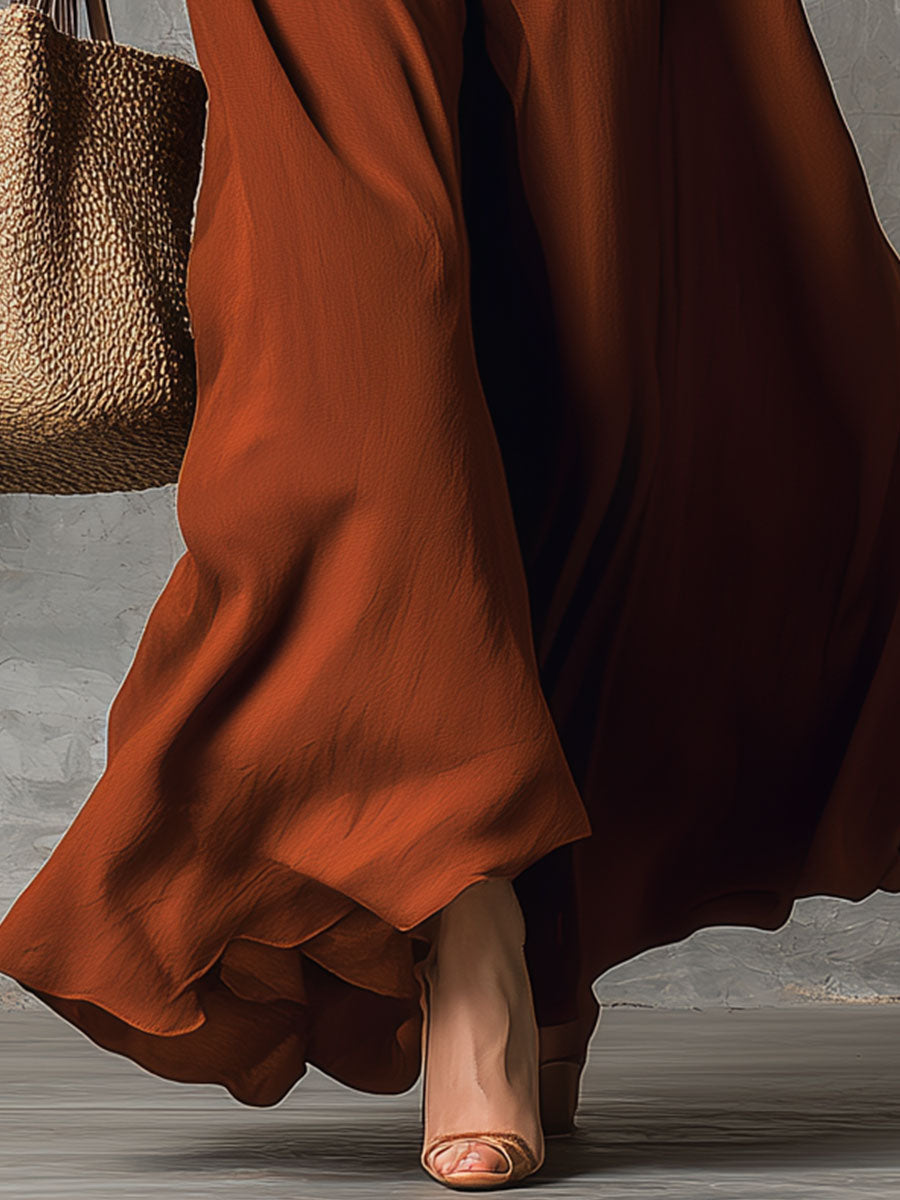 Vintage-Inspired Orange Maxi Dress with Elegant Décolleté