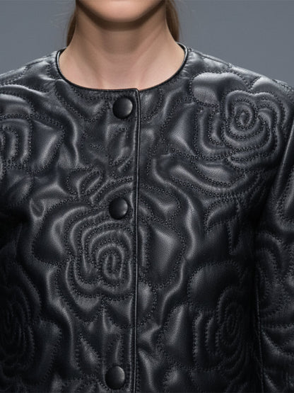 Veste courte en simili cuir noir avec détails floraux au col rond