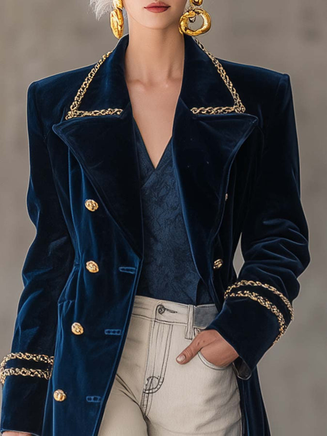 Veste en velours bleu nuit avec col en métal et boutons avant, embellie de touches dorées au style western