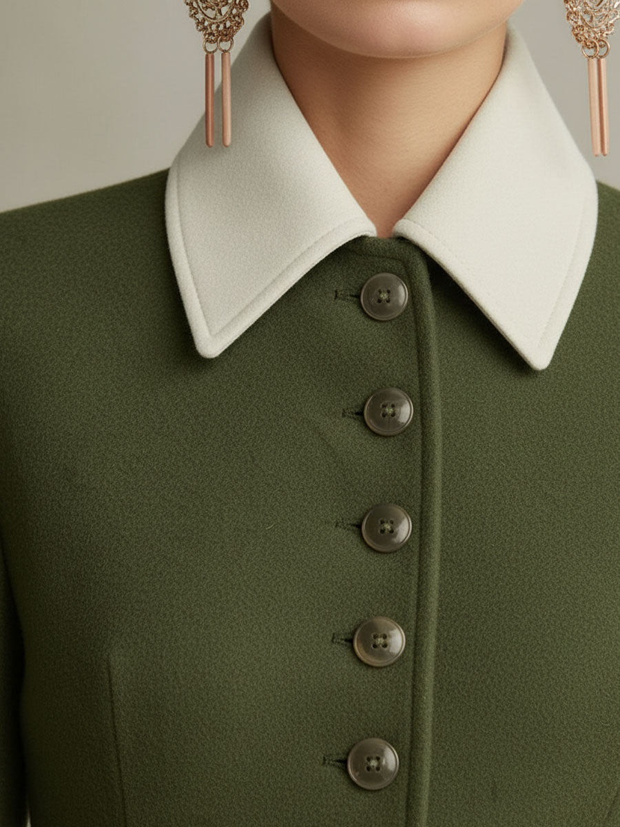 Veste en laine élégante avec col, boutonnage simple et poches à surpiqûres contrastées